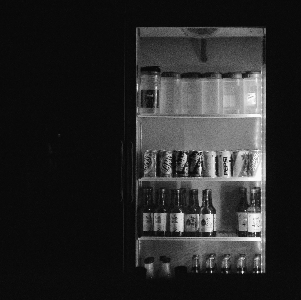 a night time view into a restaurant