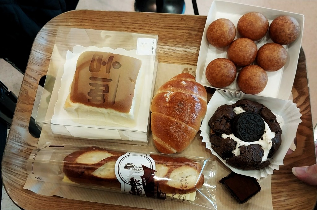 Cheesecake, dough balls and pretzels at a bakery outside of Seoul