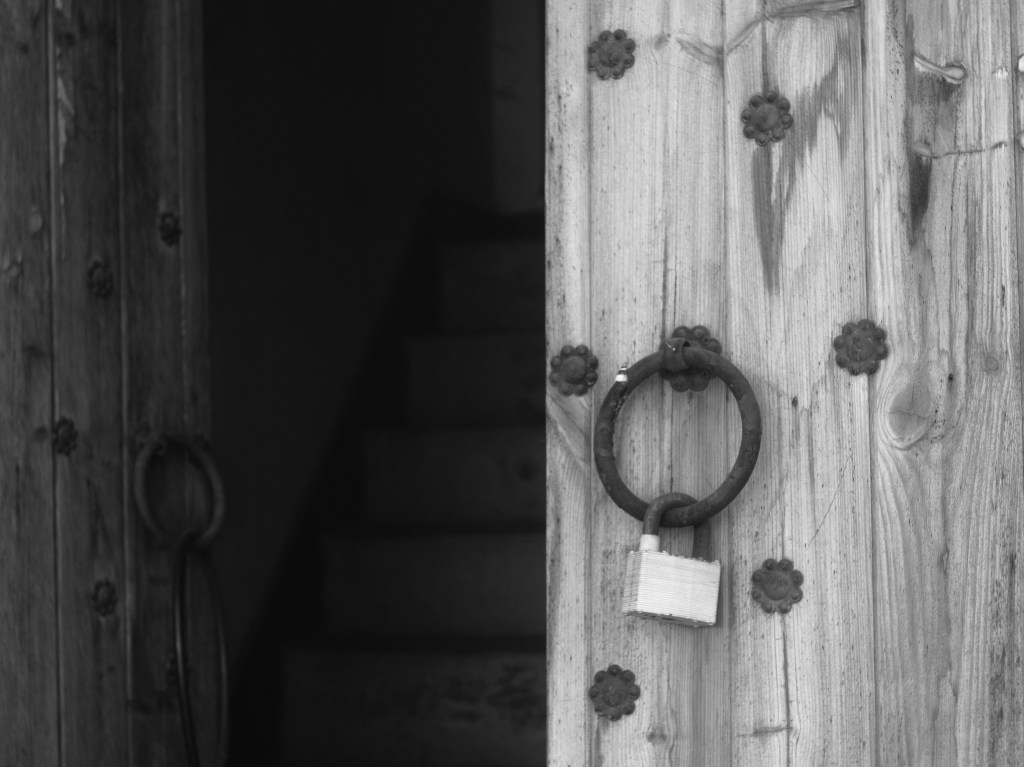 A door with a lock in Black and White
