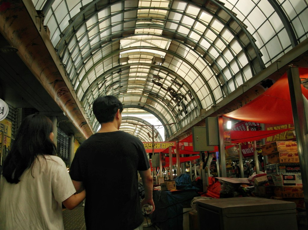A couple walking at a market
